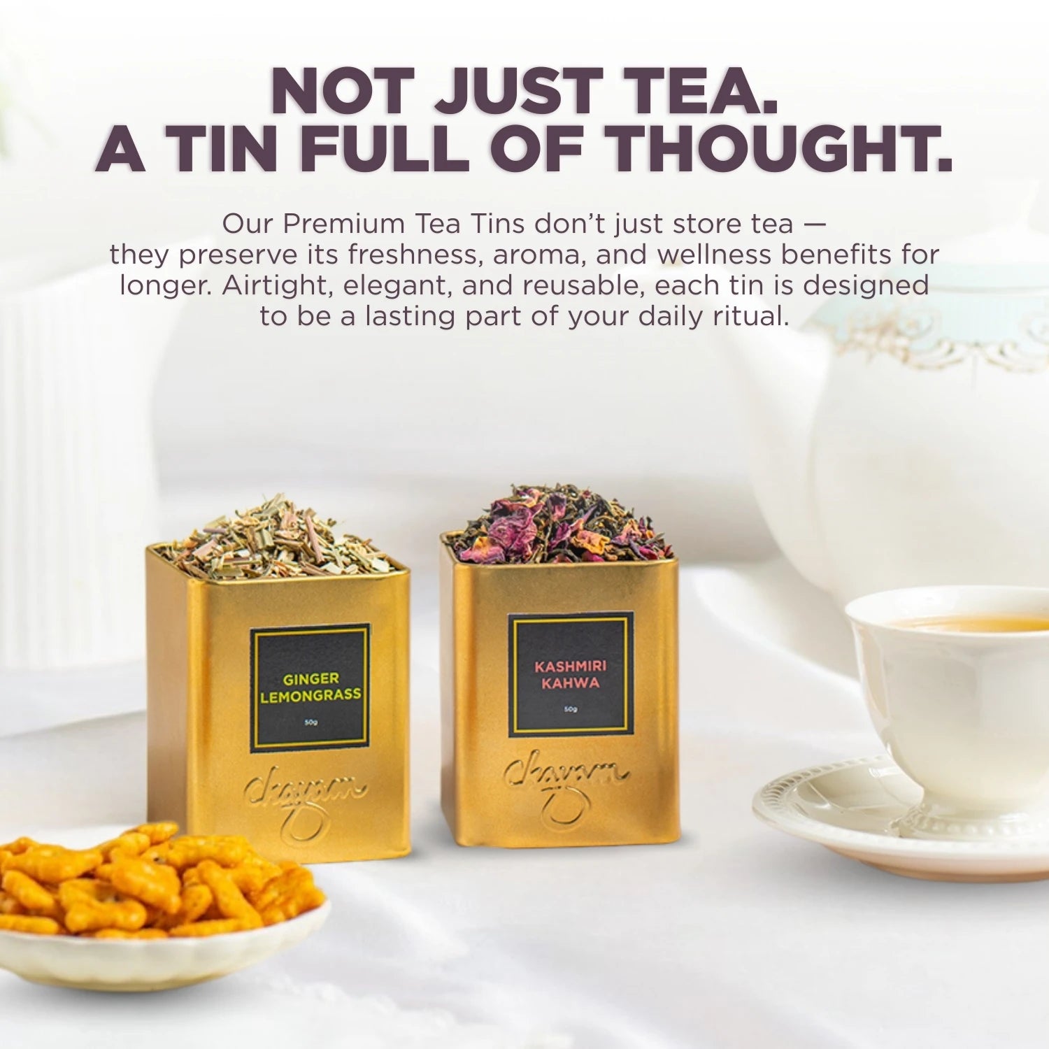 Two gold tea tins with tea leaves on a white surface, accompanied by text about the benefits of the tea tins.