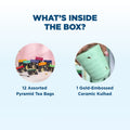 Tea box contents with tea bags and a kulhad on a light blue background